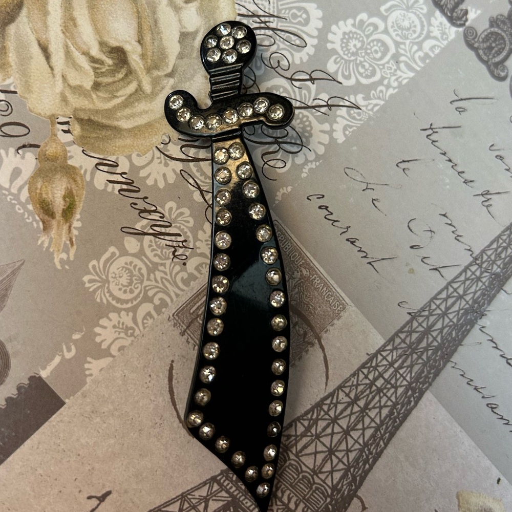 Old Celluloid and Rhinestone sword brooch
